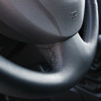 Оплетка на руль из натуральной кожи Renault Logan I (LS) Рестайлинг 2009-2014 г.в. (для руля без штатной кожи, черная)